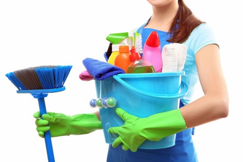 Deep cleaning kitchen cabinets during move in cleaning