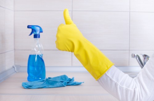 Office cleaning supplies and sanitized shared workspace