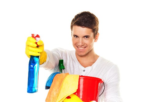 Cleaner polishing windows and frames during post construction cleaning